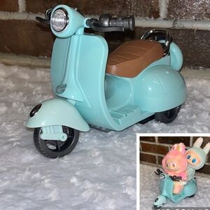 Children's Light Blue Ride-On Toy Scooter with Brown Seat